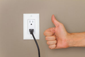 Thumbs up and Electric cable